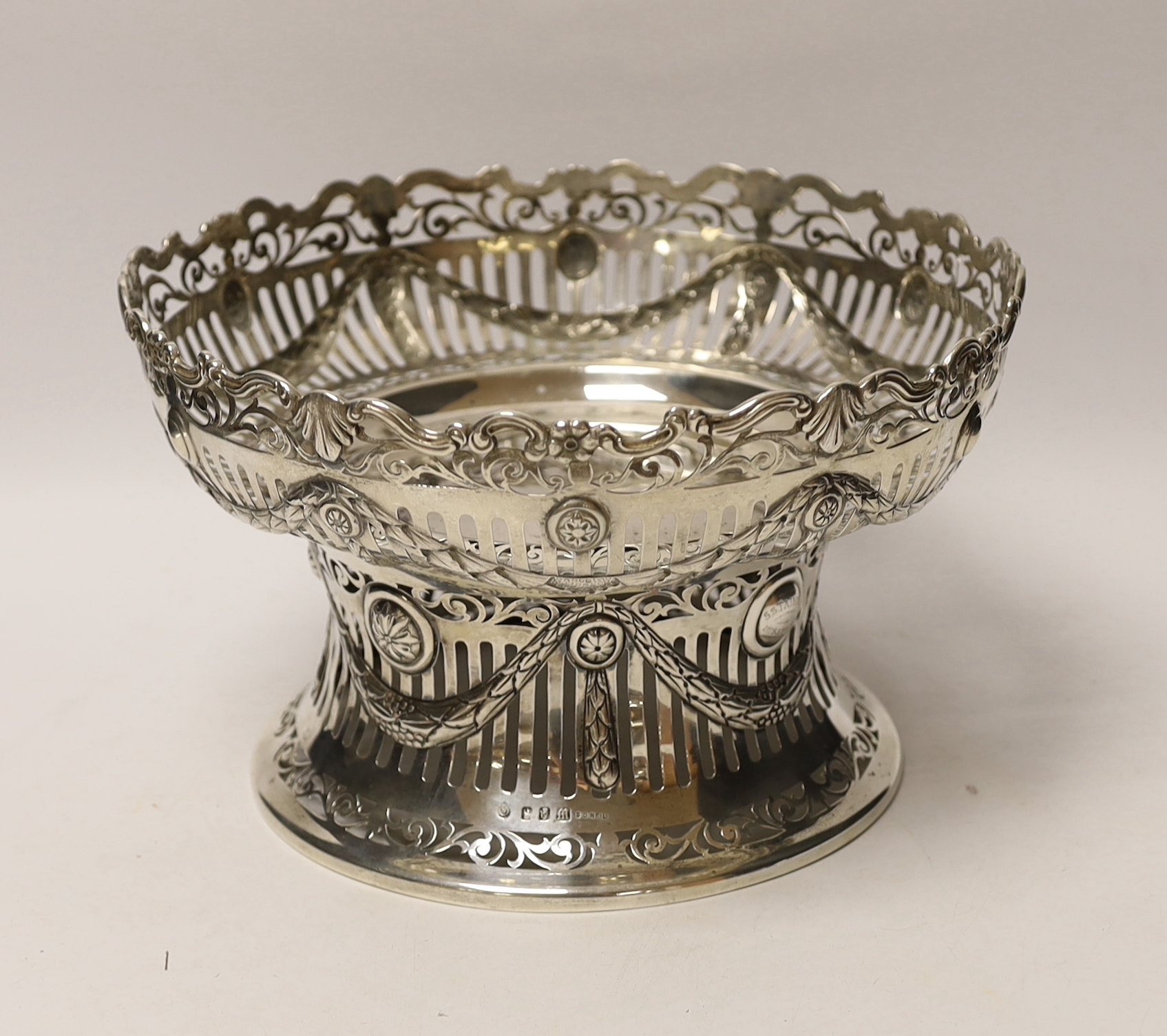 An Edwardian Irish silver dish ring and dish by Sharman D. Neil, Dublin, 1907/1908, dish diameter 25.9cm (a.f.), 26oz.